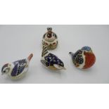 Four Royal Crown Derby bird paperweights two with gold caps 2 with silver caps