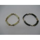 Oriental silver gilt bracelet with elongated jade bars linked by roundels pierced with oriental