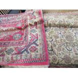 Multicoloured Persian style rug, floral field on ivory ground within red repeating border W160cm