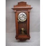 Pendulum wall clock with key