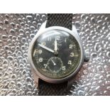 WWII Timor "Dirty Dozen" military issue wristwatch, stainless steel case on military style webbing