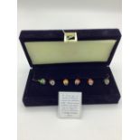 Fabergé guilloche enamel wine charms, edition I arrow head egg, in dark blue velvet case with