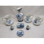 Delft ware jugs, miniature mugs, butter dish and saucer etc (8)