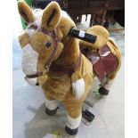 Unusual child's mechanical hobby type horse upholstered in plush finish with rise and fall