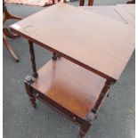 Victorian mahogany two tier occasional table on turned supports and brass casters, 49 x 39 x 74cm