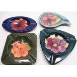 Moorcroft Hibiscus, Anemone and old Anemone ashtrays (3 and 1 similar) all with impressed makers