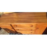 Ercol light elm rectangular sideboard with two cupboards enclosing three drawers W115cm D43cm H68cm