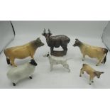 Three Beswick cows, a sheep, Dalmatian, Royal Doulton stag