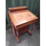 Late Victorian mahogany Davenport pierced fret work gallery over stationery compartments, angled