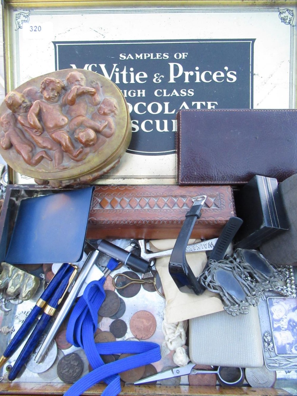 McVitie & Price's high class chocolate biscuit sample box containing small collection of coins,