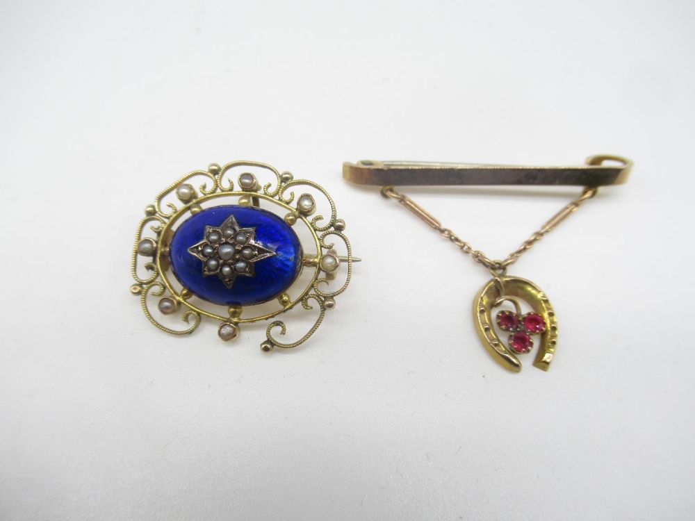 Victorian 9ct rose gold bar brooch with three garnets mounted in horseshoe pendant suspended on a