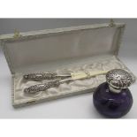 Pair of Edwardian ivory glove stretchers with repoussé decorated silver hallmarked handles by Henry