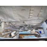 Ede leather medical case, fitted interior containing forceps, syringes silkworm gut and other