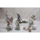 Seven various Lladro figures and a Czechoslovakian Lladro figure of a shepherd and sheep