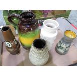 four pieces of West German pottery including a green, brown and yellow jug, small brown jug,