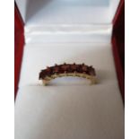 Teenage Cancer Trust Fundraiser - 9ct gold and seven stone ruby ring
