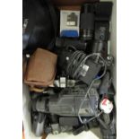 A selection of various camera equipment, a Sony F385 video camera, Minolta SRT100, a Panasonic Lumix