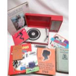 A Phillips battery portable record player in red plastic case, 33RPM records, comics and other