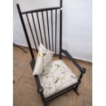 Contemporary shaker style Swedish ebonised rocking chair with spindle back, padded seat, on turned