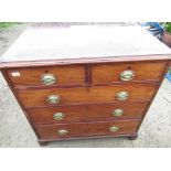 C19th mahogany chest of two short above three long drawers with inlaid detail to the top on raised