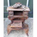 C20th Victorian style cast metal Queenie stove on cabriole style legs