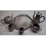 Late Victorian EPBM four piece silver plated tea set of melon form with bright cut and raised