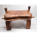 Camel type stool with leather swab cushion