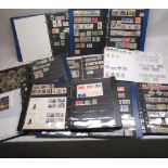 Ten stamp albums of mixed international postage stamps