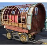 Bow Topped Horse Driven Caravan with fitted interior(Lacking Canvas)mounted on flatbed cart with