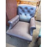 Late 19th Century Gentlemans Club Chair in Brown Leather on Turned Tapering Feet terminating in