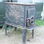 Mid c20th Trolla gas fired enamelled stove with single plate and cast panels