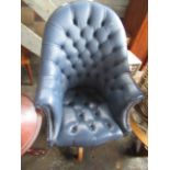 Blue leather deep buttoned back Chesterfield style swivel office armchair