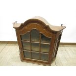 C20th century Italian medium oak wall display cabinet with arched top, arched glazed panel door