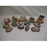 Fourteen Border Fine Arts and Enesco Beatrix Potter figurines on bases, including "Peter Rabbit