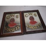 C.W.S., Corsets pair of early C20th advertising mirrors in molded rosewood grained frames W31.5cm