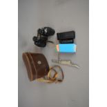 Pair of binoculars with leather carrying case, new unused monocular with carrying pouch, modern