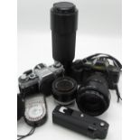 Canon AE1 35mm SLR camera body (boxed), a Canon T70 with Canon 35-105 lens (boxed), a Canon A