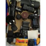 Box of various camera equipment including a Sigma 400mm F5.6 lens for Canon FD fit, a Tamron 500mm