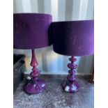 Pair of brushed metal table lamps on open work columns, similar lamp with plain column, large