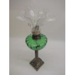 Late C19th - early C20th oil lamp with moulded green glass reservoir and barley twist column on