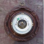 Early C20th walnut cased aneroid barometer, stamped 5534