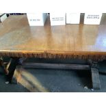 C17th style oak rectangular dining table on turned and carved melon bulb supports with stretcher,