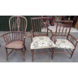 C19th elm and ash Windsor armchair and two early C20th armchairs with stick splats and upholstered