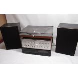 Bang & Olufsen record player, Sony integrated amplifier, CD player and two speakers