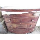 Early C20th mahogany bowfront chest of four drawers with turned handles and turned supports,