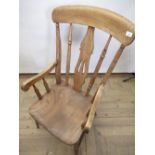 Late c19th/early c20th elm and beech farmhouse chair, solid seat on turned tapering legs with H-