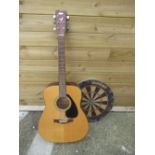 Yamaha F-310 acoustic guitar and Winmau Diamond dartboard (2)