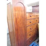 Victorian mahogany drop centre wardrobe, four cockbeaded drawers enclosed by pair of arched panel