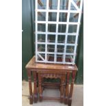 Early C20th nest of three oak tables on turned and blocked supports, wood and metal wine rack, (2)