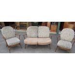Pair of dark Ercol open frame armchairs with upholstered cushions and stick back, two seater Ercol